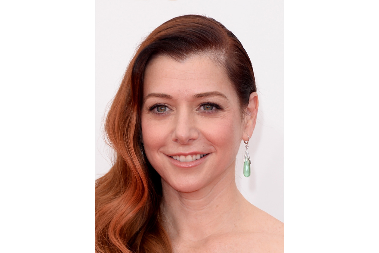 Alyson Hannigan: il rosso arancione è smorzati da un hair style molto femminile