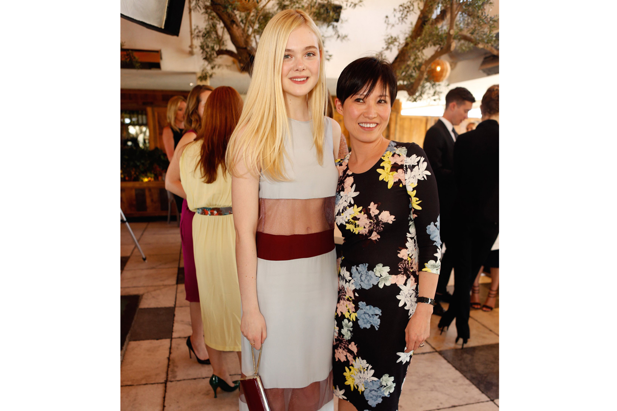 Elle Fanning & Sandra Choi, Creative Director Jimmy Choo attend the Jimmy Choo & THR Powerstylist Luncheon in LA photo by Jeff Vespa