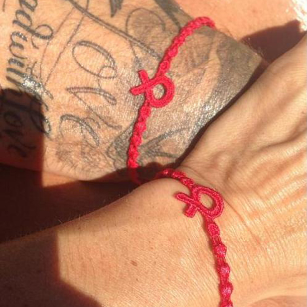I Beckham indossano “ Fiocco Rosso “, il bracciale Cruciani per UNAIDS