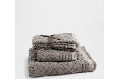 Asciugamani in cotone con decoro geometrico a rilievo