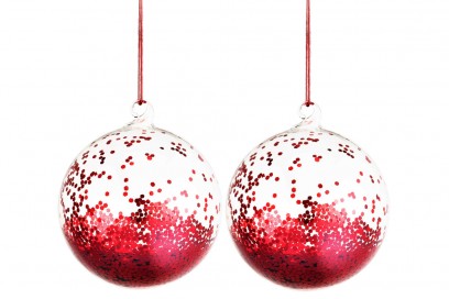 Le palline in vetro piene di glitter rossi