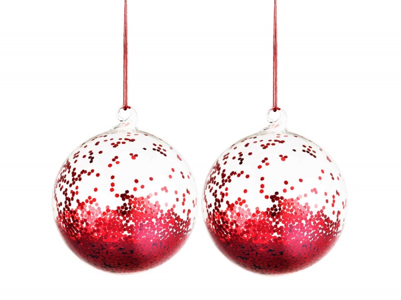 Le palline in vetro piene di glitter rossi