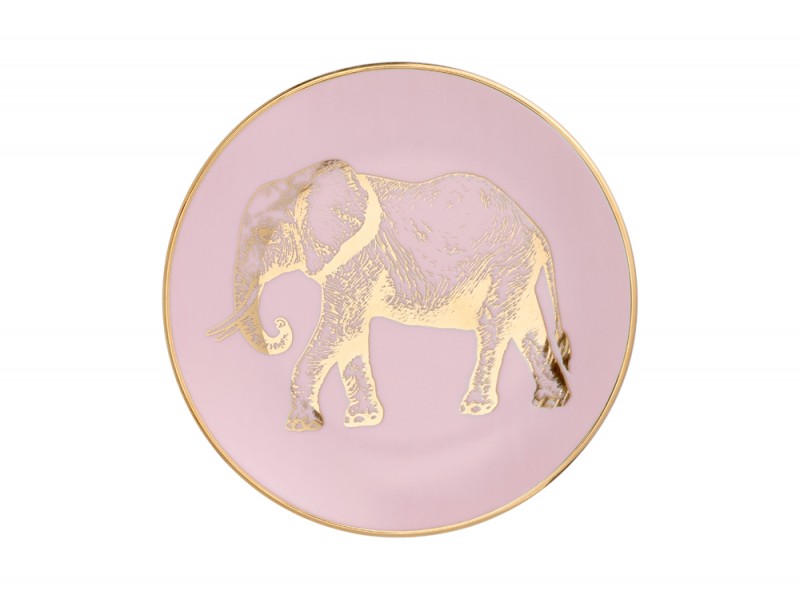 Un elefante oro sul piatto rosa