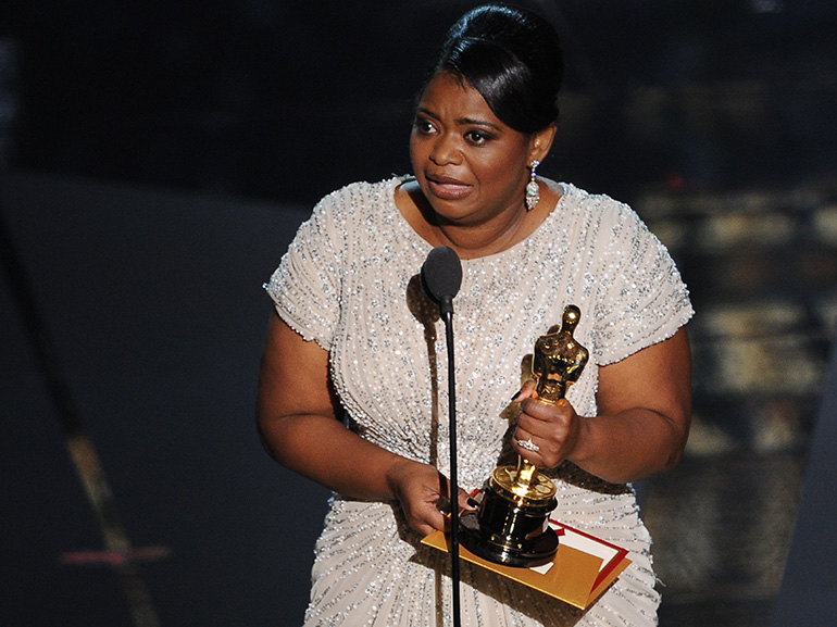 The winner for Best Supporting Actress O