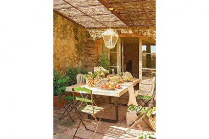 14-stile-rustico-veranda-tavolo-sedie-ferro-battuto