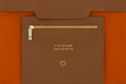 coccinelle-borsa-interno-busta-arancio