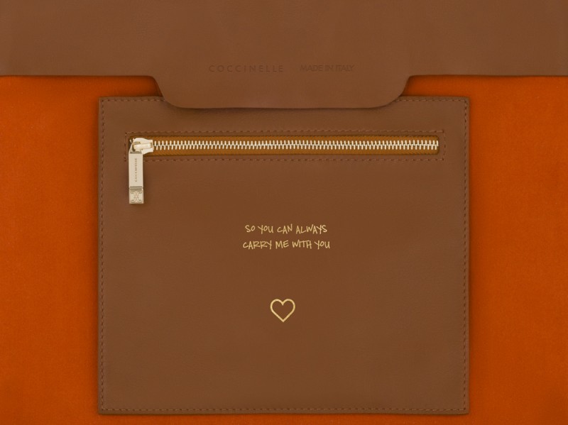 coccinelle-borsa-interno-busta-arancio