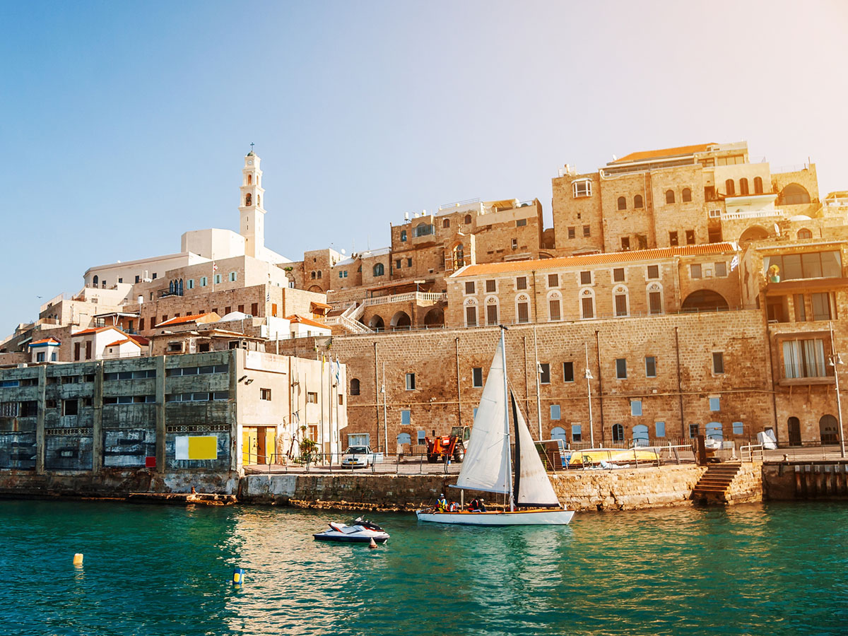 Sailboats In Sea Against Buildings In City