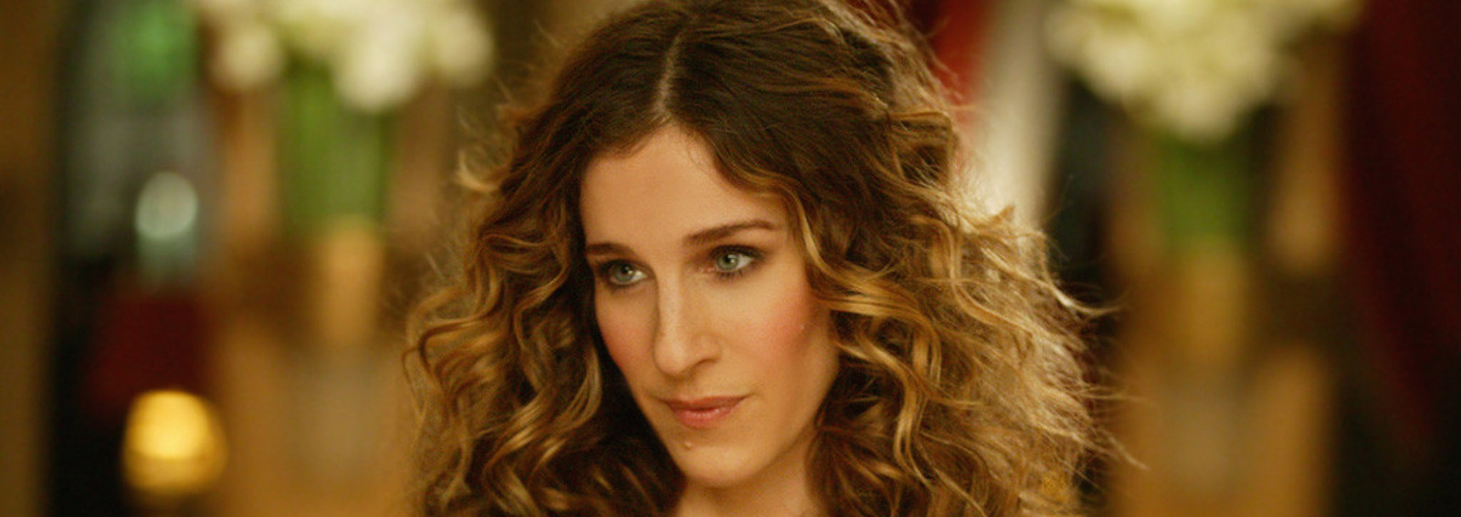 Carrie Bradshaw capelli ricci