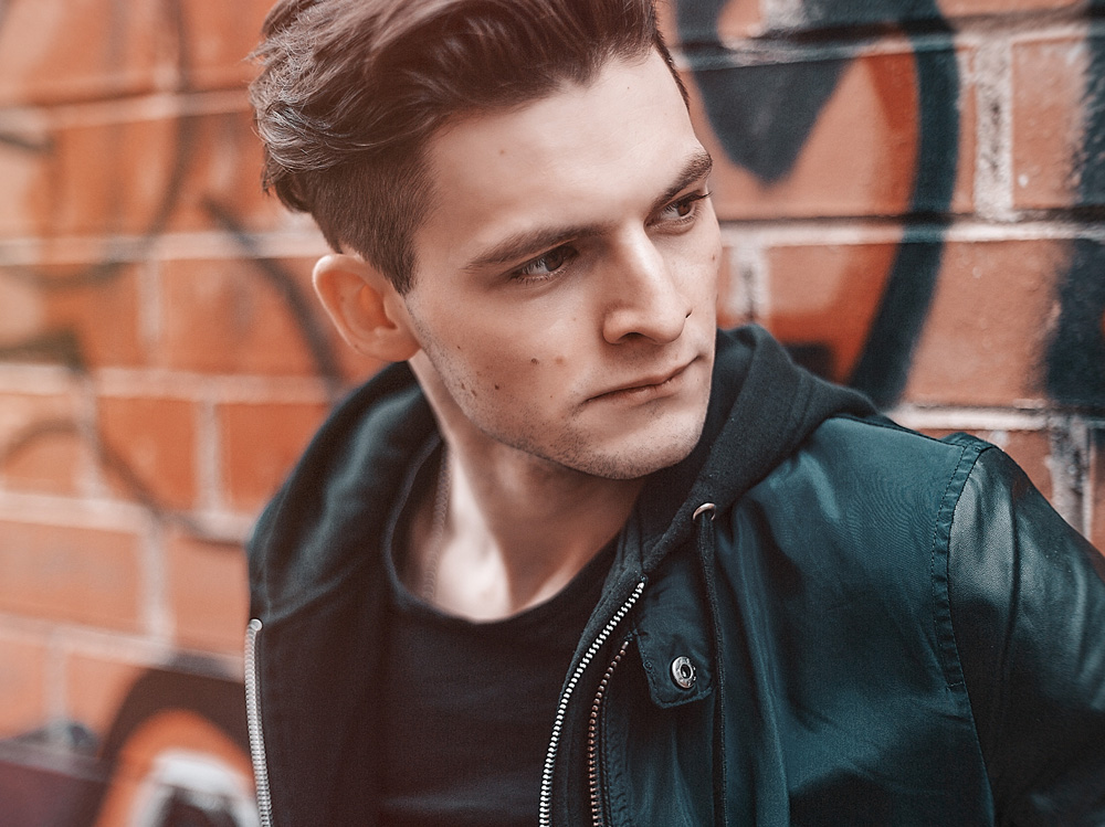 adult-black-leather-jacket-blur-713829