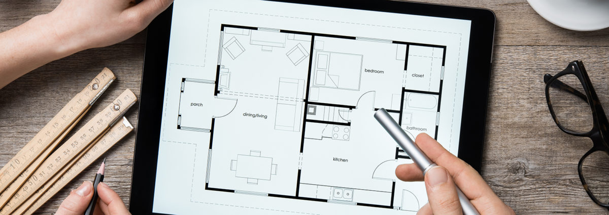 Architect working on digital tablet