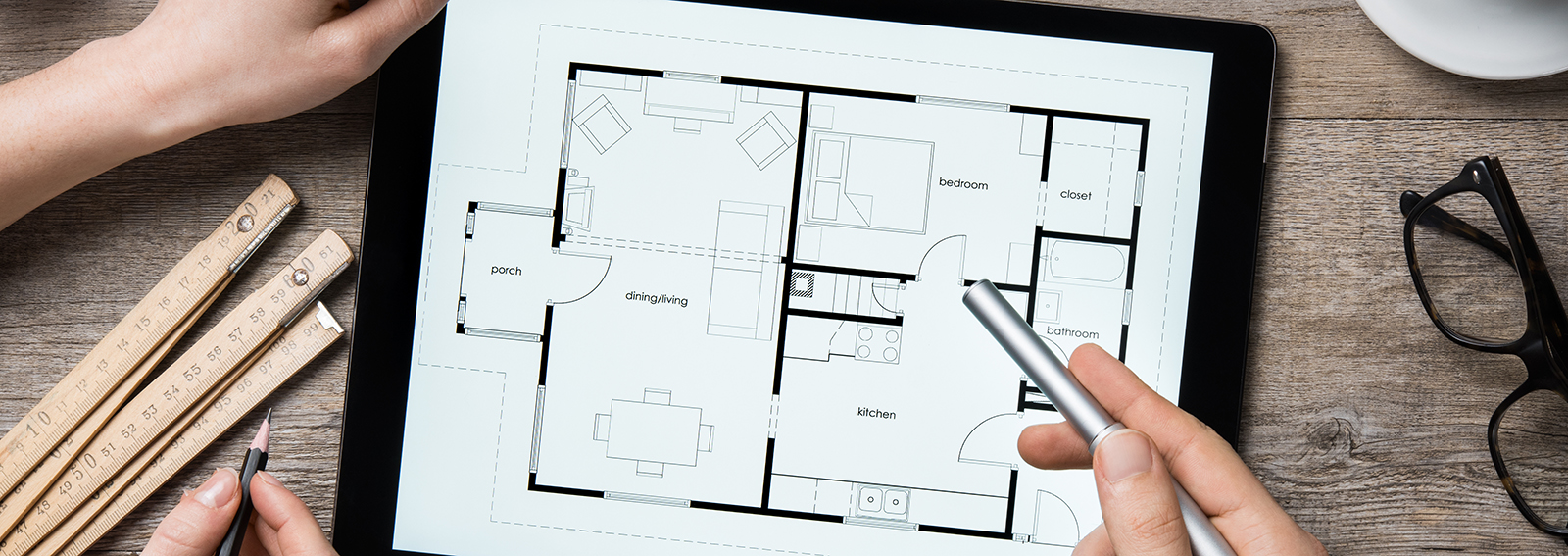 Architect working on digital tablet