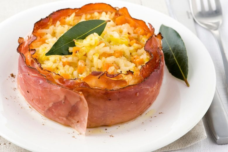 Risotto con zucca gialla e speck