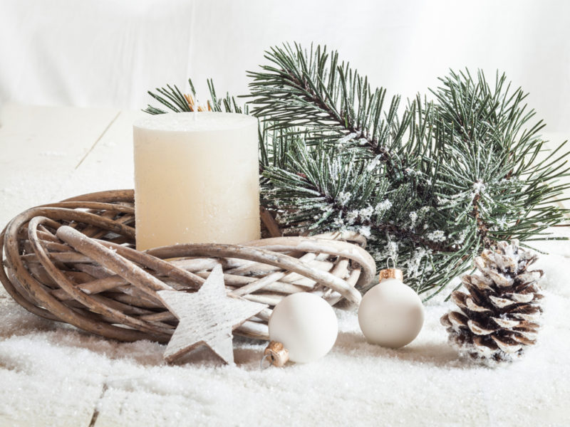 Christmas decoration, candle, artificial snow, twigs, cone, baub