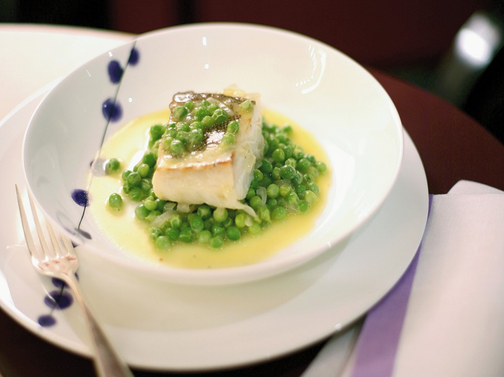 Pesce con piselli in umido