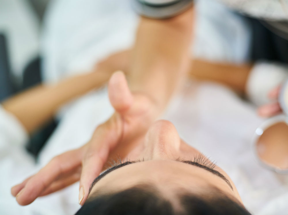 person-touching-woman-s-face-3148935