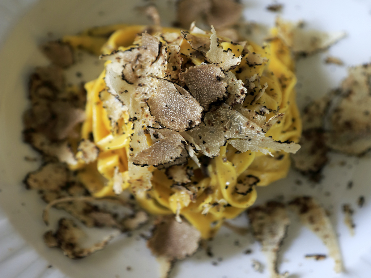 A dish of egg pasta with truffle
