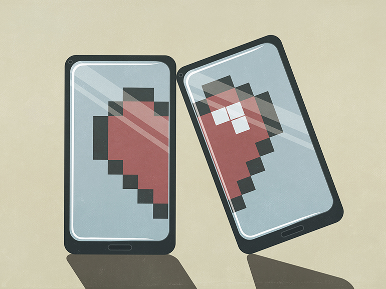 Pixelated broken heart on smart phone screens