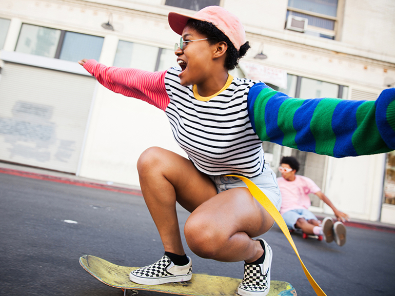 Young woman skateboarding