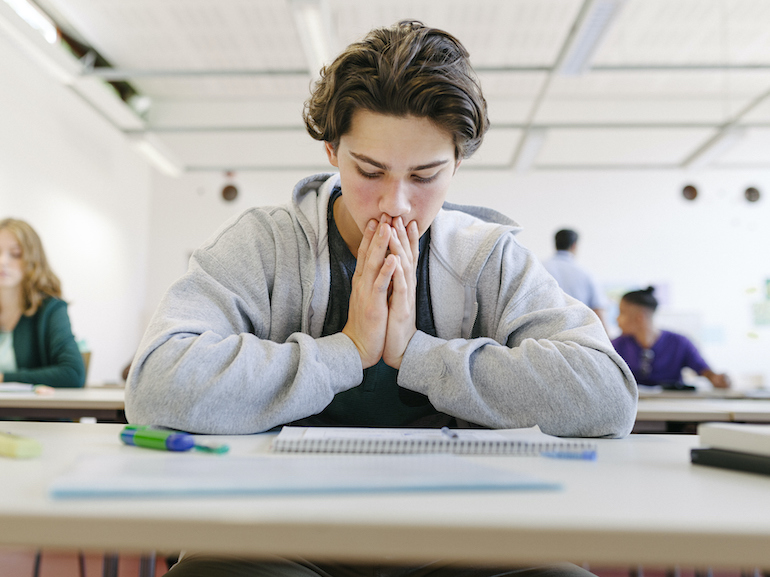 Worried Student Looking At Test