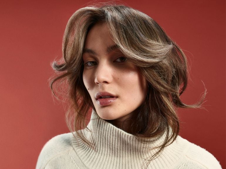 mobile curtain bangs capelli lunghi