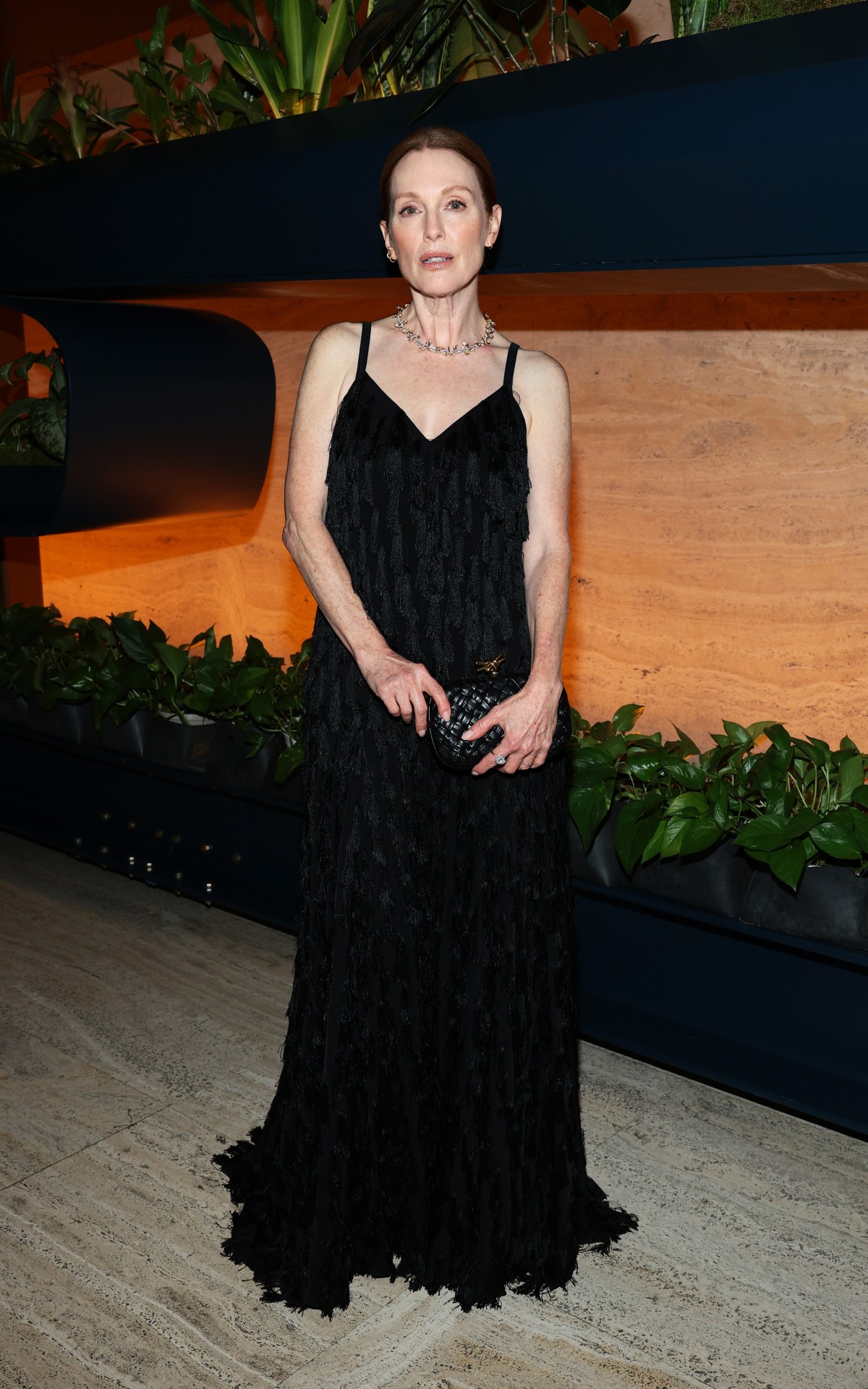 ok JULIANNE MOORE WEARS BOTTEGA VENETA AT THE CARING FOR WOMEN DINNER