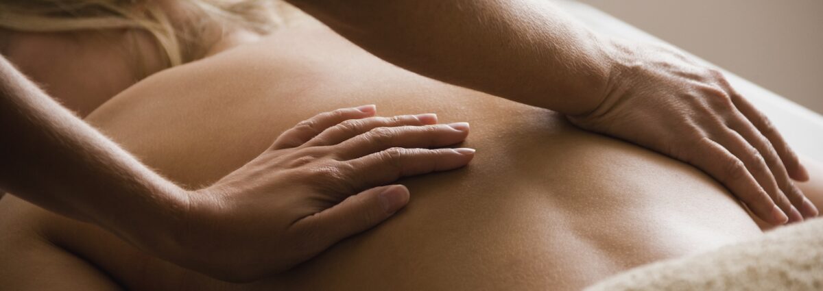 Caucasian woman receiving massage